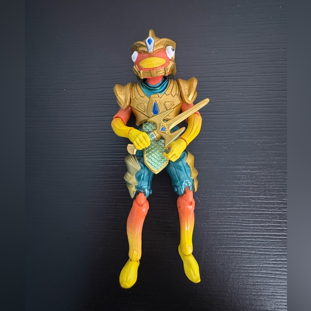 Fortnite Solo Series Atlantean Fishstick action figure with weapon. Approx 4” PO